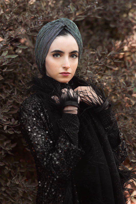 Twisted metallic strips turban