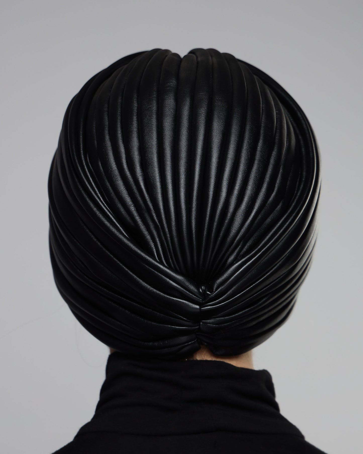 Twisted leather turban