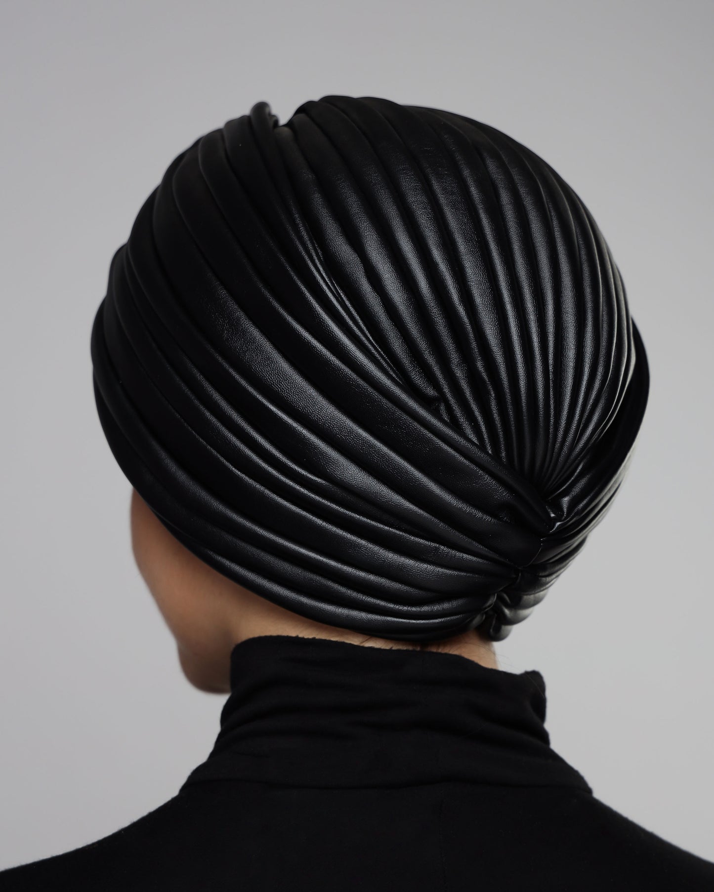 Twisted leather turban