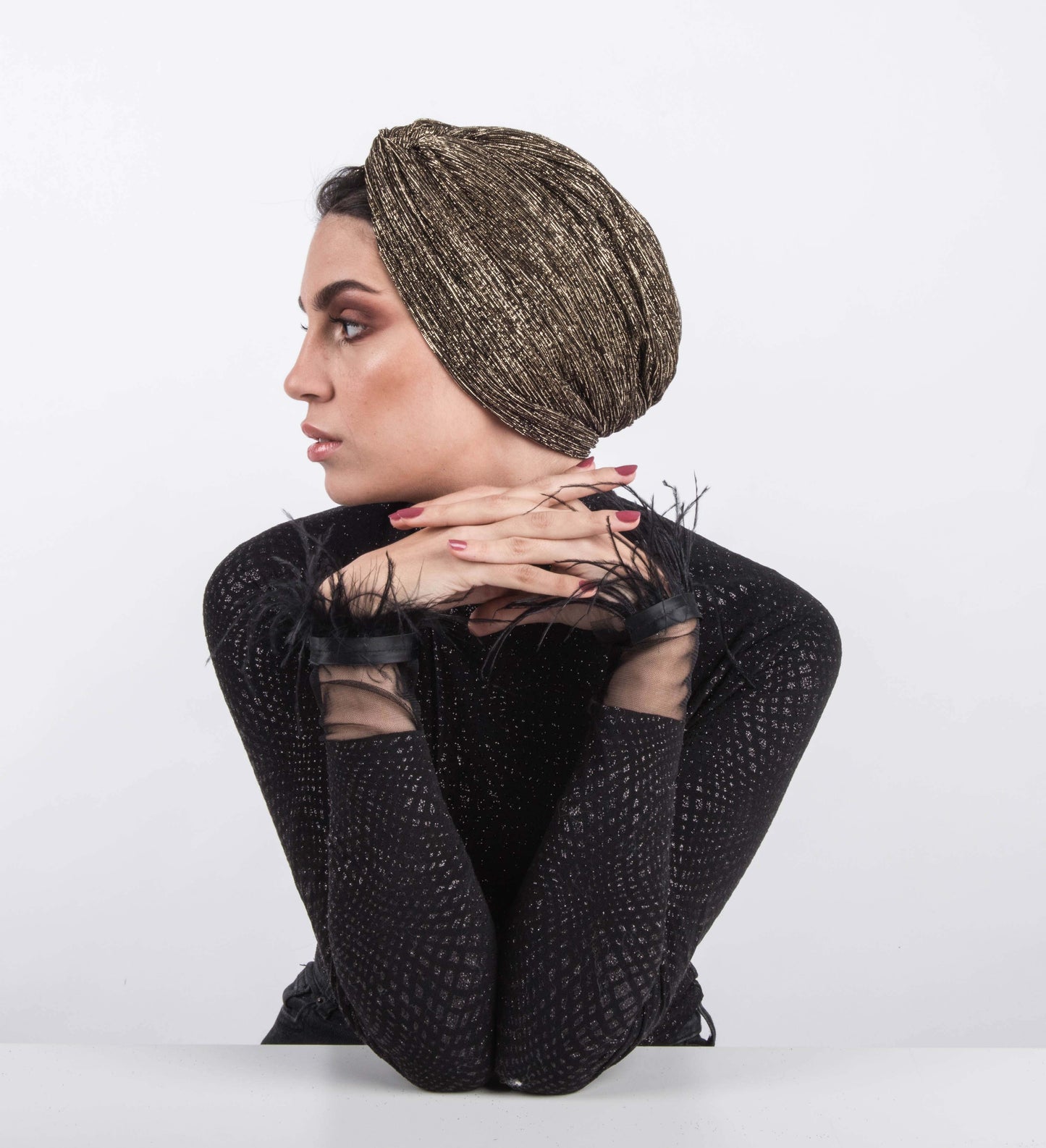 Twisted metallic strips turban