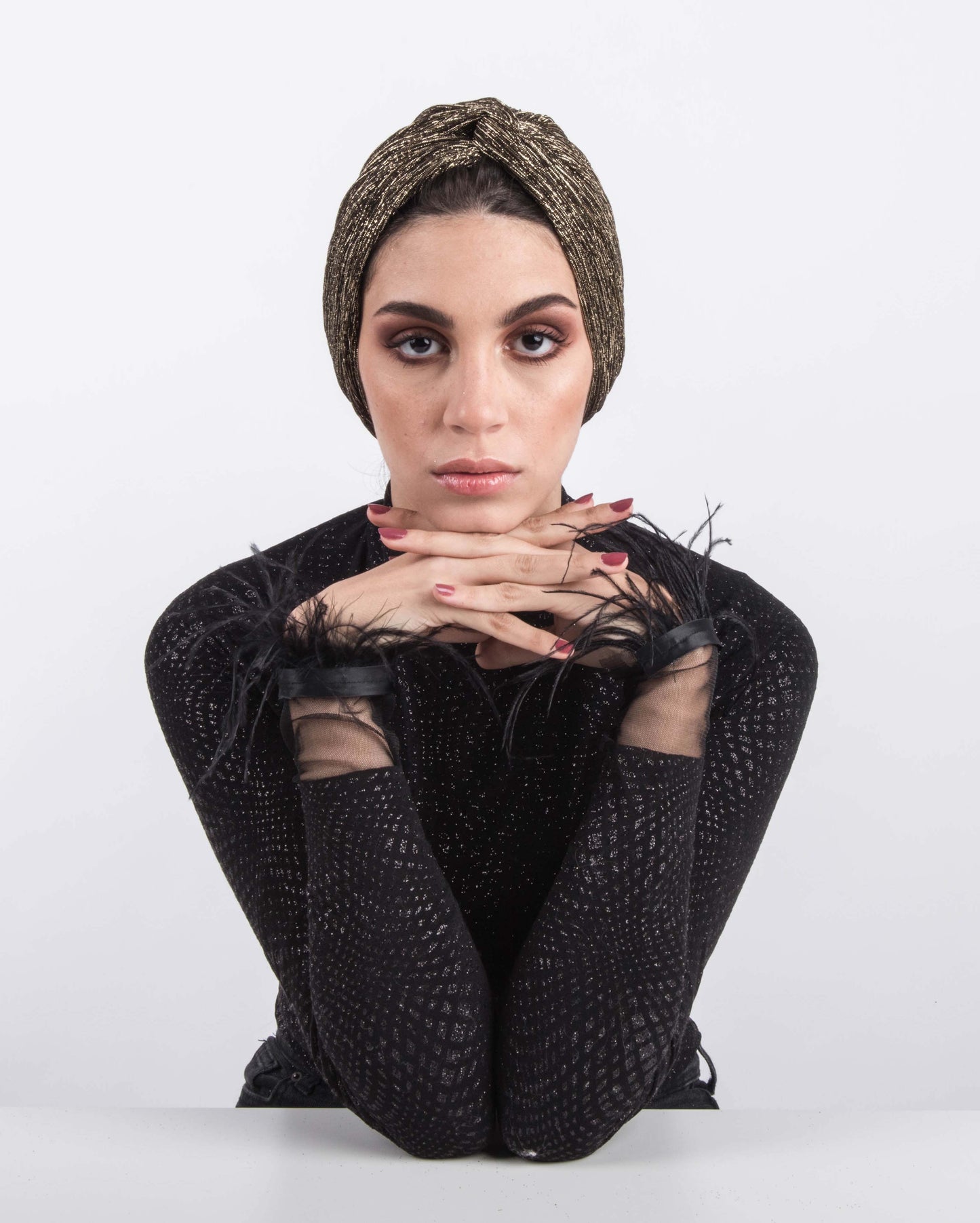 Twisted metallic strips turban